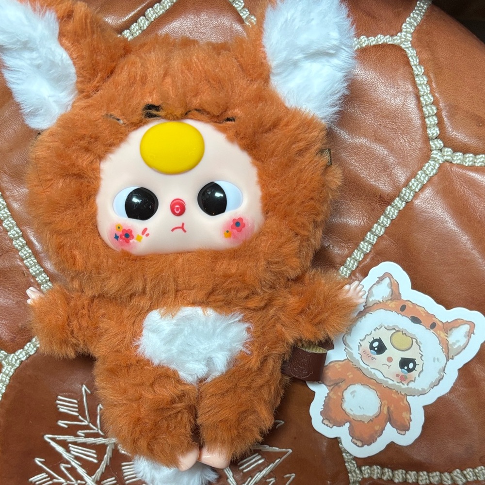 Adorable Orange and White Plush Toy